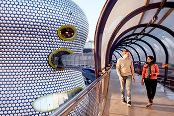 Students walking over bridge at Birmingham the Bullring