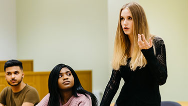 Female law student delivering a speech