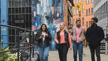 Students walking though city of Birmingham